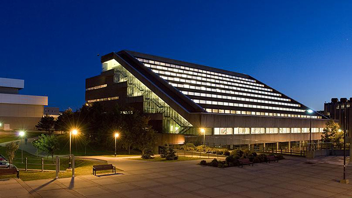A photo of the exterior of the QEII library from 1982